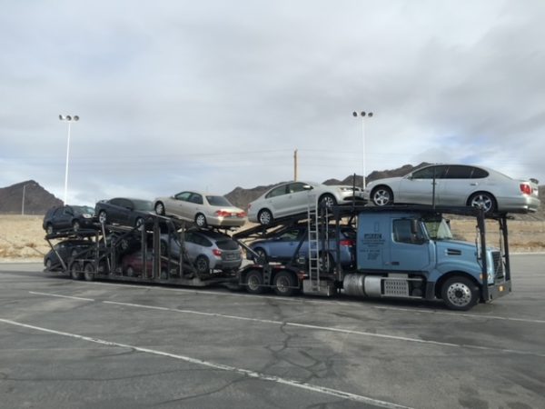 2015  Volvo VAH64300 and 2006 10 Car Carrier