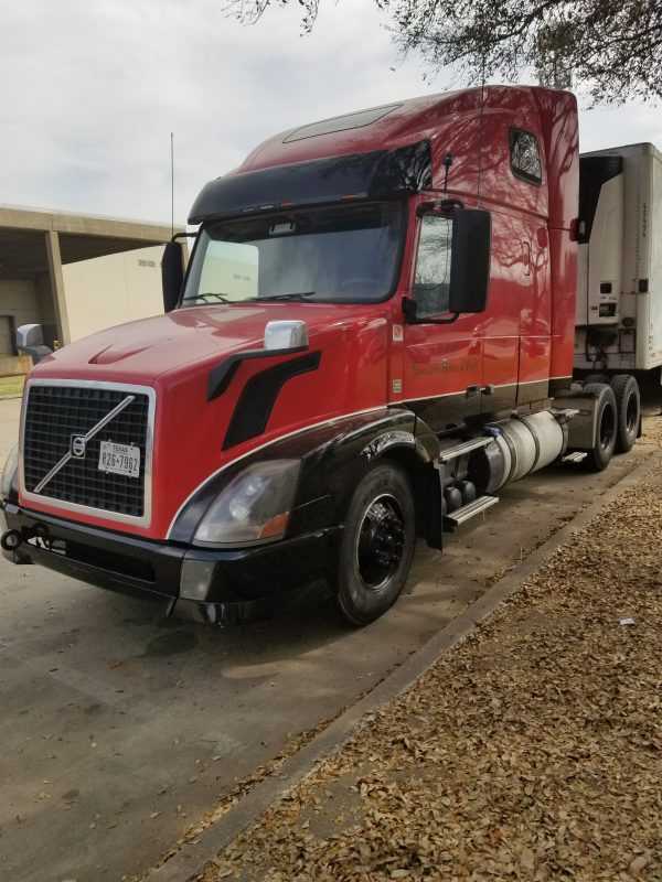 2012 Volvo VNL64T670 - Image 2