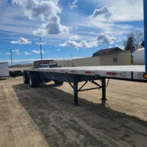 2008 UTILITY FLAT BED SPREAD AXLE TRAILER