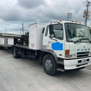 2007 Mitsubishi FM 330 with, 2022 Hooper Equipment Trailer, 22.5 Ton, Gooseneck and 2006 PJ Dump Hurricane Clean Up Trailer, 10 Ton, Gooseneck.