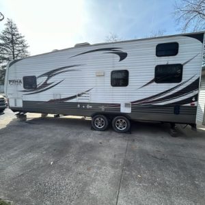 2013 PALOMINO BY FOREST RIVER  UNLEASED PUMA 27-SBU